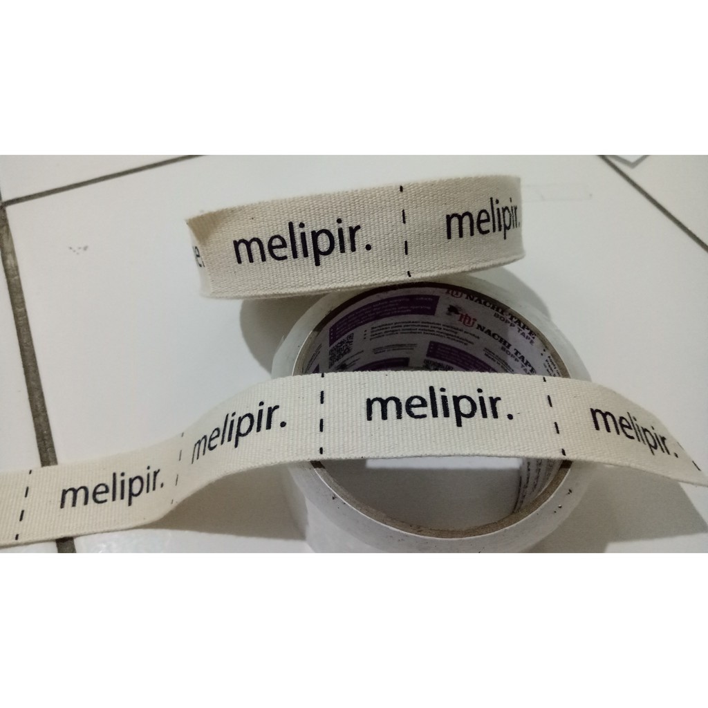 

LABEL KATUN PITERBAN/TWILLTAPE MOTIF BINTIK SABLON