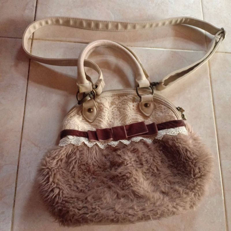 tas cantik axes femme