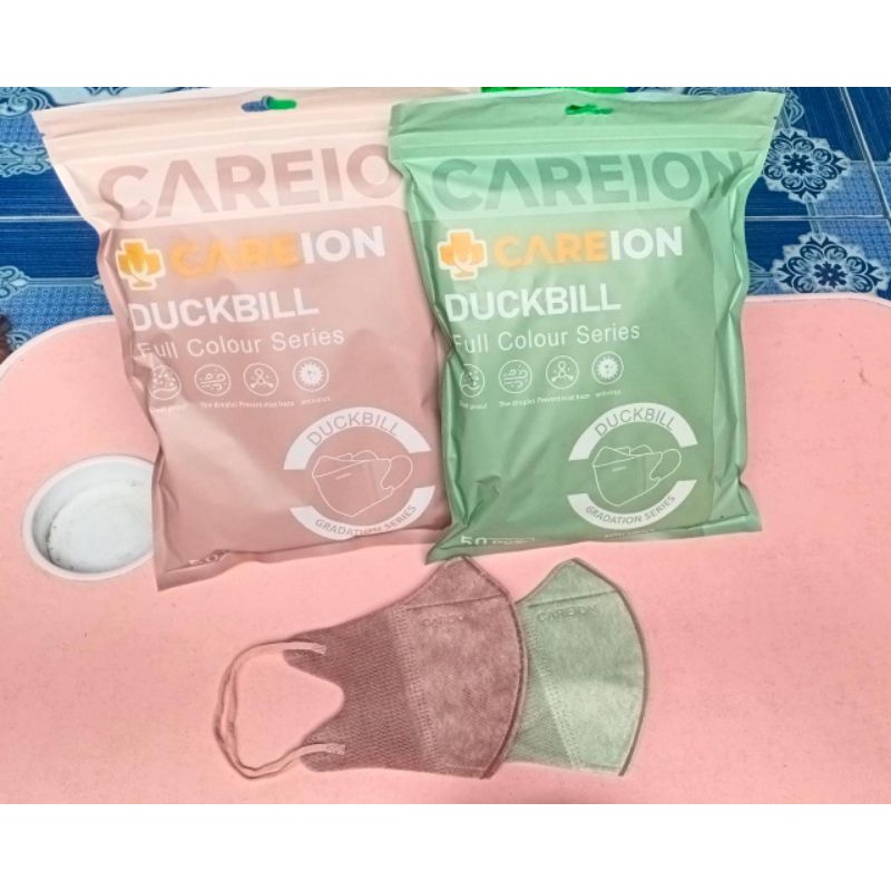 masker duckbill CAREION 3ply isi 50pcs