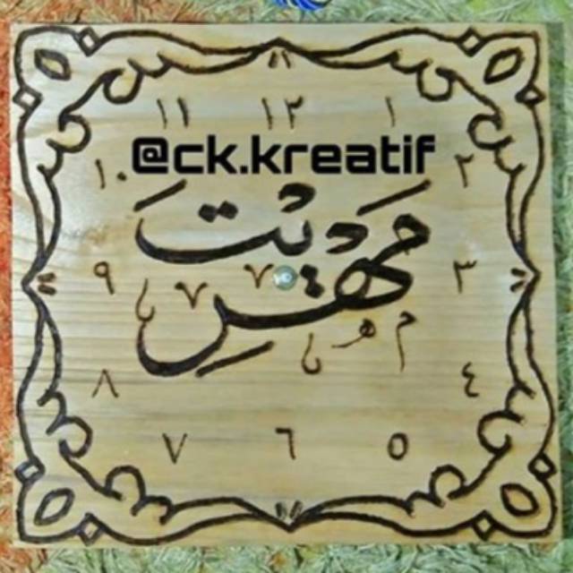 Jam dinding kayu ukir kaligrafi murah