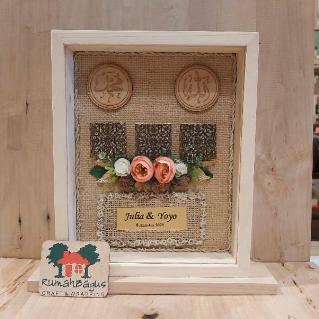 Frame mahar logam mulia