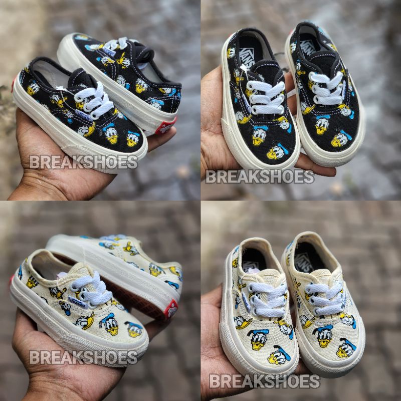 Sepatu anak autentik tali motif donald duck hitam/krem