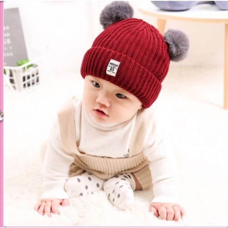 topi rajut model pompom