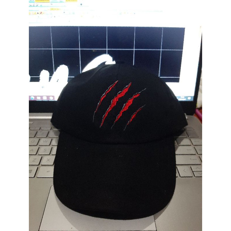 topi taring black panther