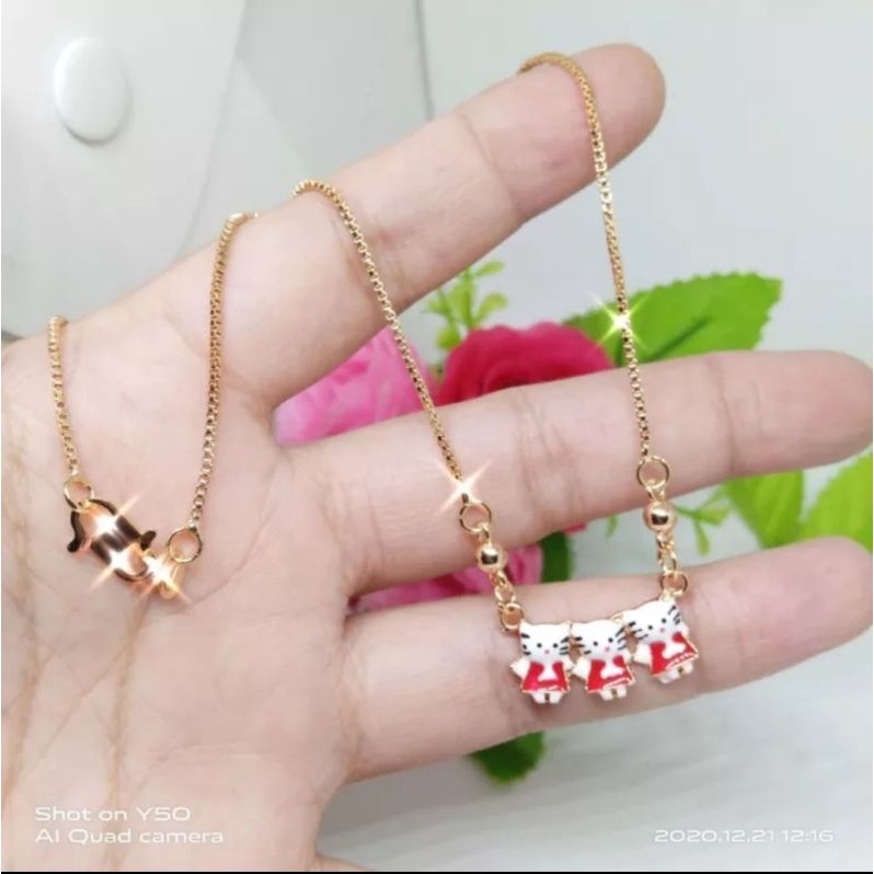 kalung gold liontin hello kitty merah