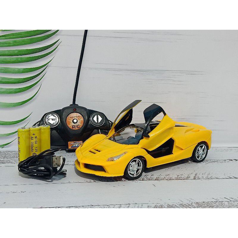 Mobil remote control Lamborghini buka pintu charger modern team