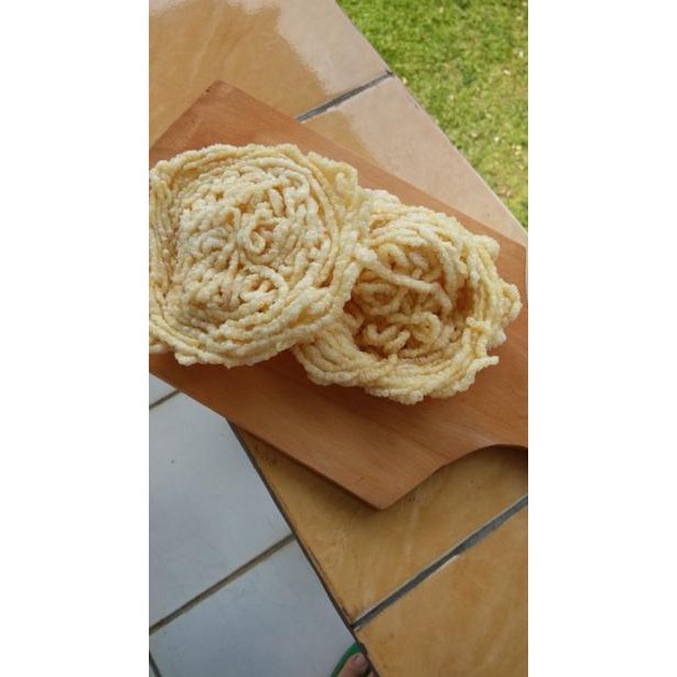 

Miliki Sekarang Kerupuk mie bogor wayang emas 88 / kerupuk mie asinan bogor renyah gurih nikmat tanp
