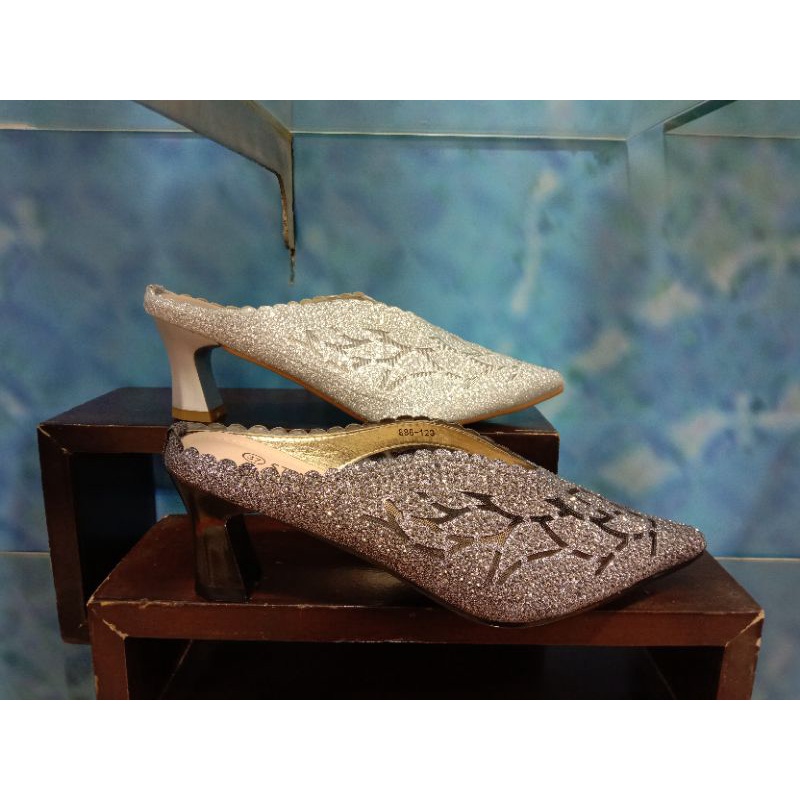 Sepatu pesta wanita merk st moritz