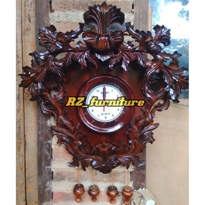 jam dinding ukiran kayu jati asli pengrajin jepara