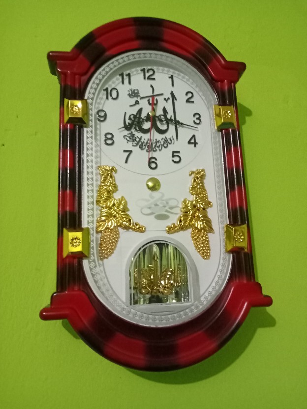 Jam Dinding Unik Bunyi Komedi Putar