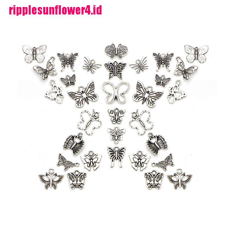 60pcs / set Liontin Bentuk Kupu-Kupu Warna Silver Gaya Vintage Tibet Untuk Perhiasan