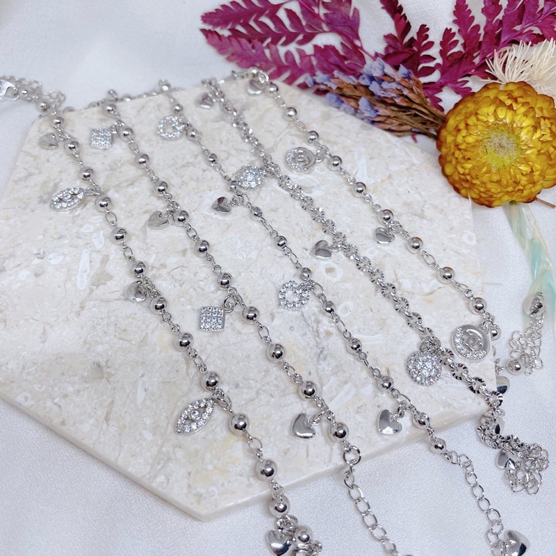 Gelang rumbai mata putih Xuping