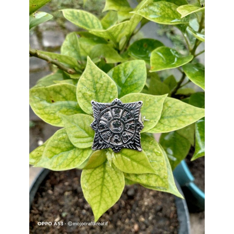 pin motif Surya majapahit