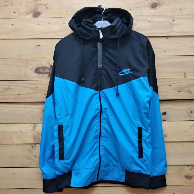 Jaket parasut nike hitam biru