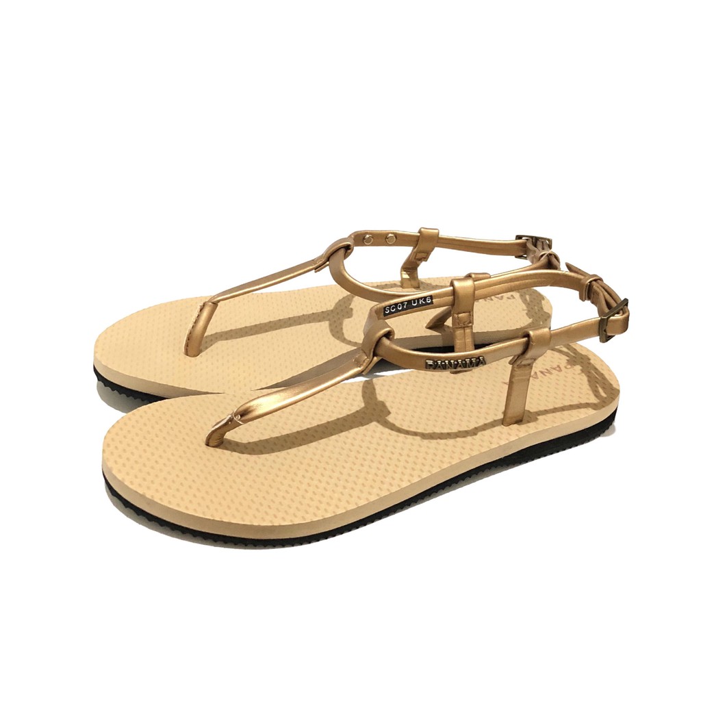 gold flip flops