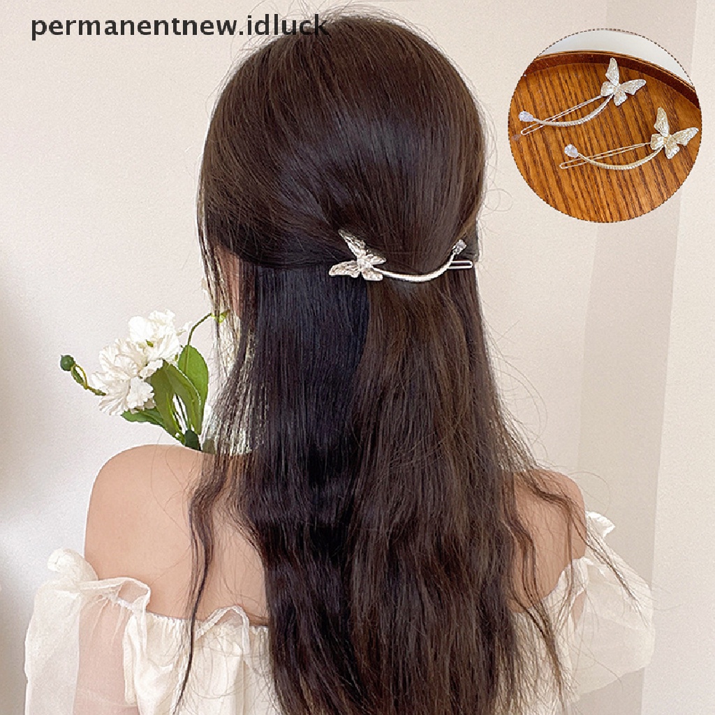 Jepit Rambut Model Butterfly Aksen Mutiara Bahan Metal Gaya Retro Untuk Wanita