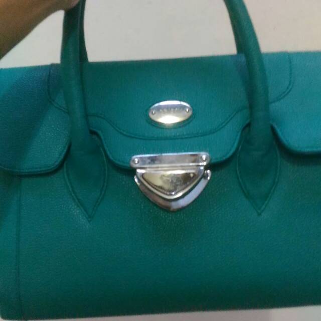 Tas tosca crisby,kwalitas super,bahan taiga/kulit jeruk