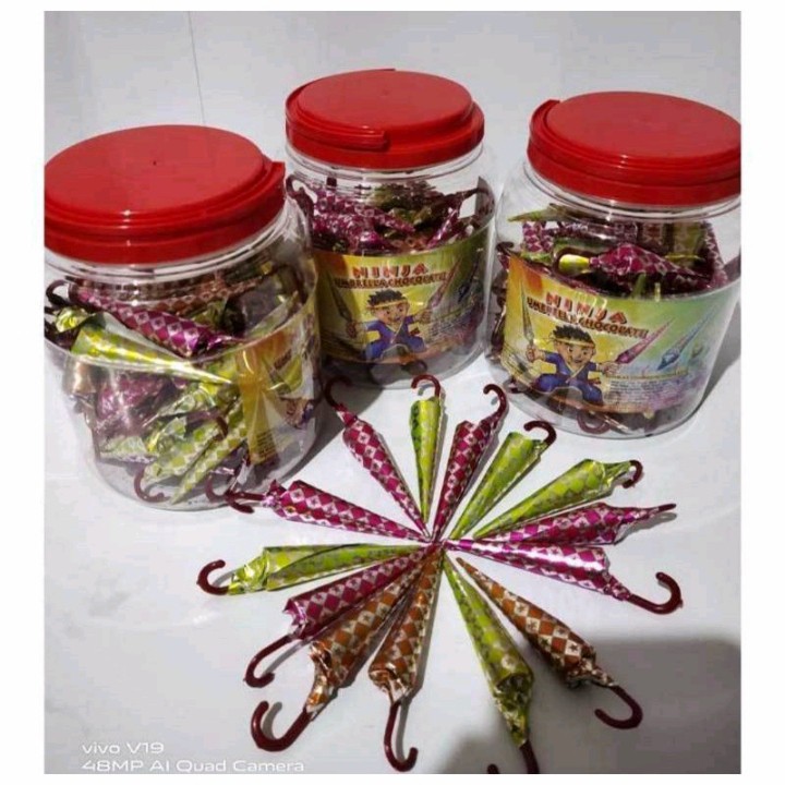 

COKLAT BENTUK PAYUNG 500 GRAM / PERMEN PAYUNG JADUL