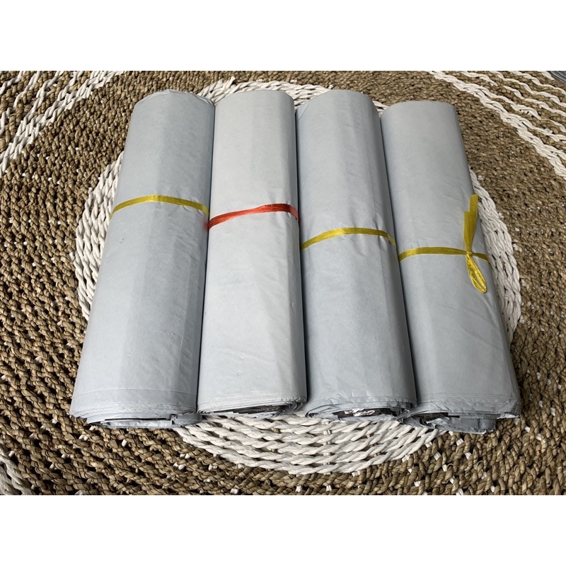 

PLASTIK POLYMAILER PUTIH 35x45 ISI 100pcs