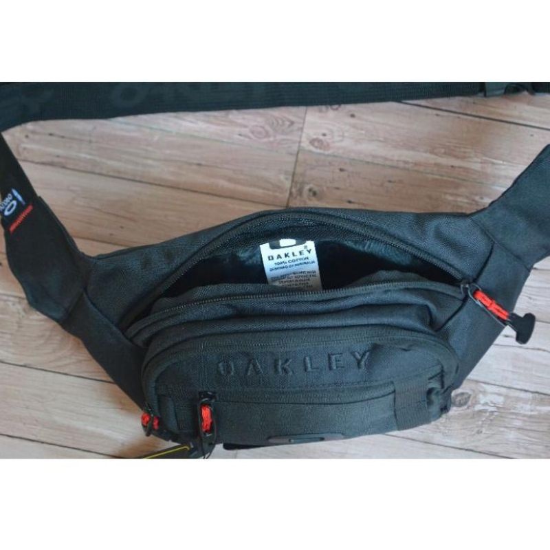 TAS OAKLEYY WAISTBAG OAKLEYY LOGO BESI TAS SELEMPANG OAKLEYY