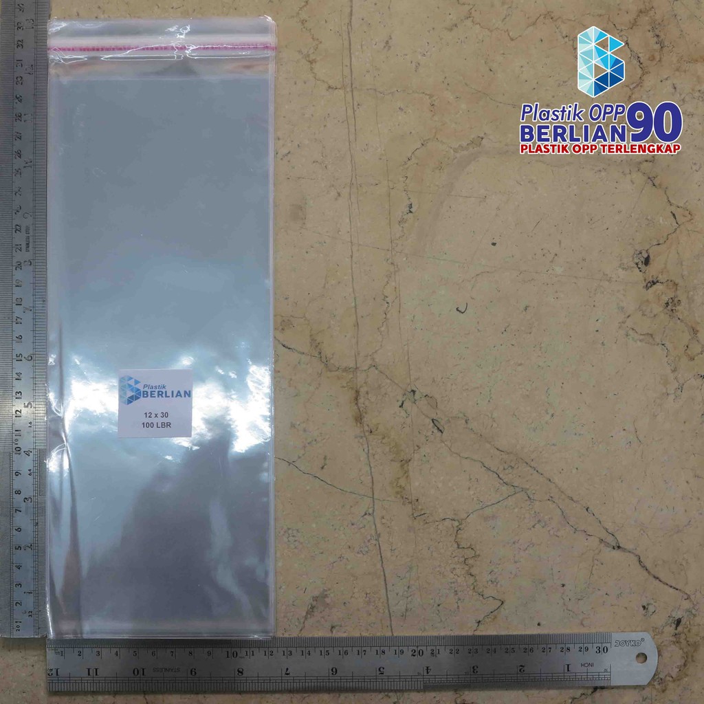 

PLASTIK OPP 12 X 30 CM 20 MIC / PLASTIK KAIN / PLASTIK GARMENT  PLASTIK BUFF