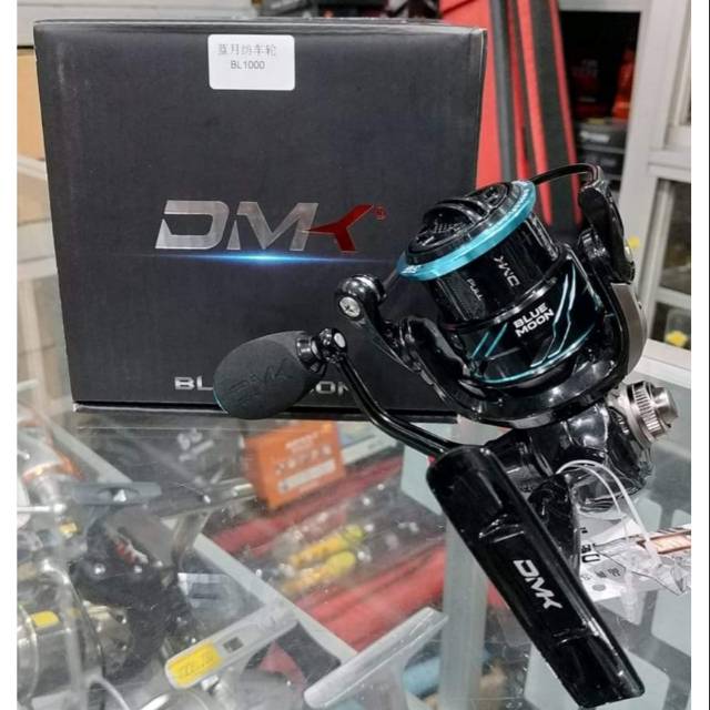 Reel pancing spinning DMK BLUE MOON 1000