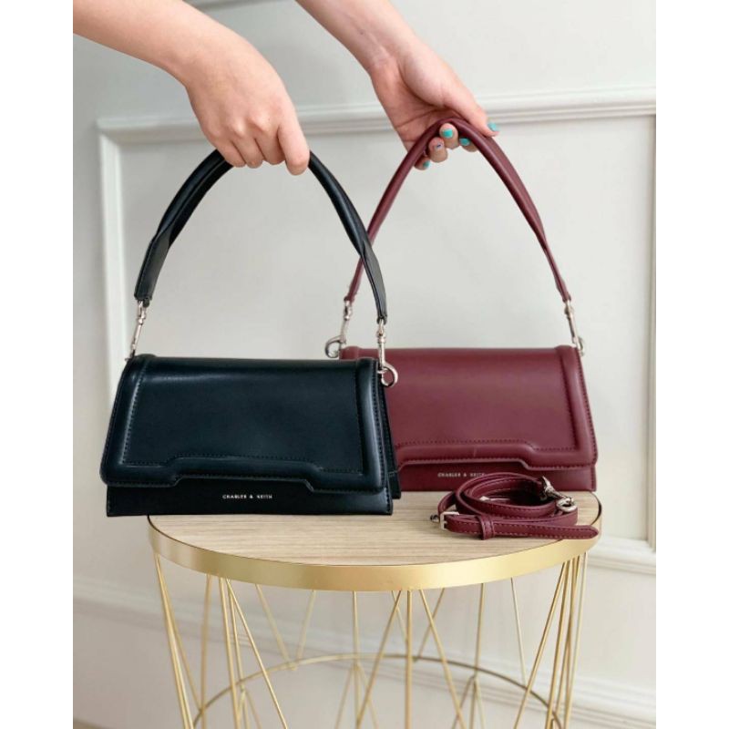 CK Trapeze Front Flap Bag