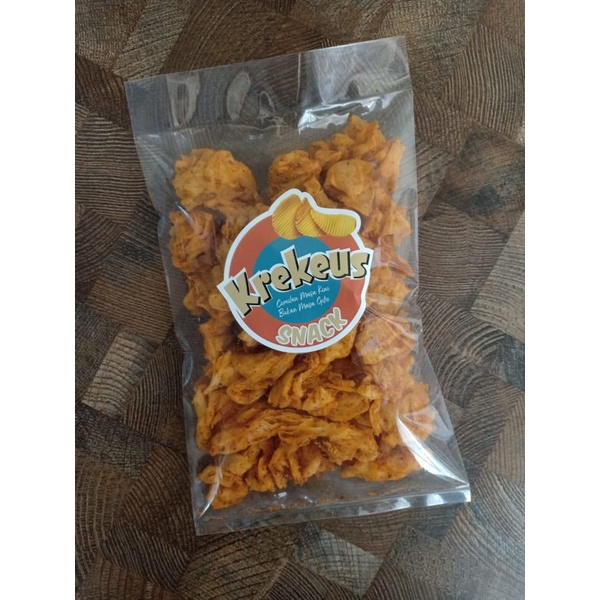 

Cemilan keripik BREKELE rasa PEDAS merk KREKEUS