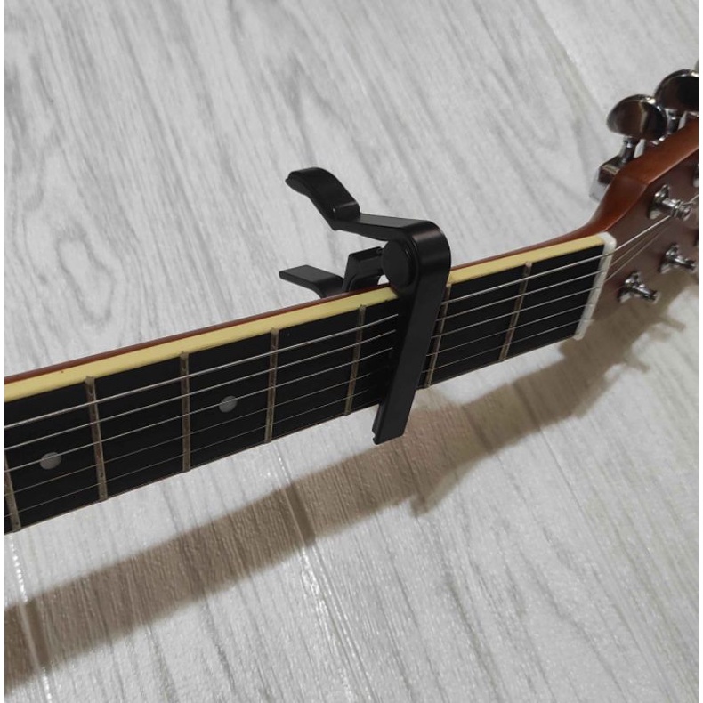 capo gitar. catok gitar bahan besi