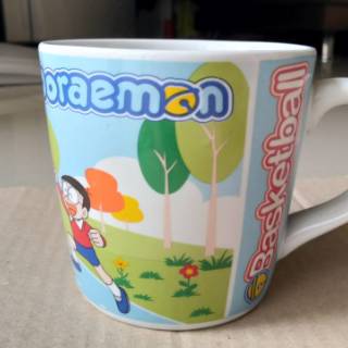 Promo MUG gelas keramik doraemon  edisi sport Shopee 