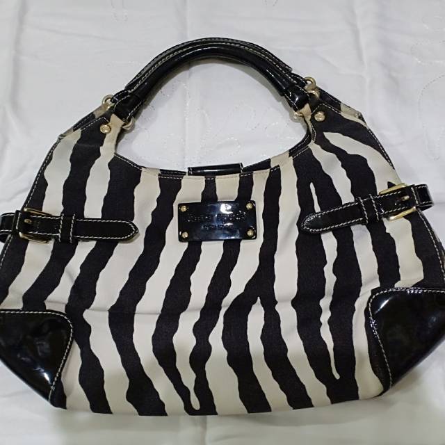 authentic pre loved kate spade zebra motif black and white color 