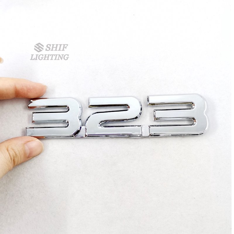 1Pc Stiker Emblem / Badge Bahan ABS Warna Krom untuk Mobil Mazda 323