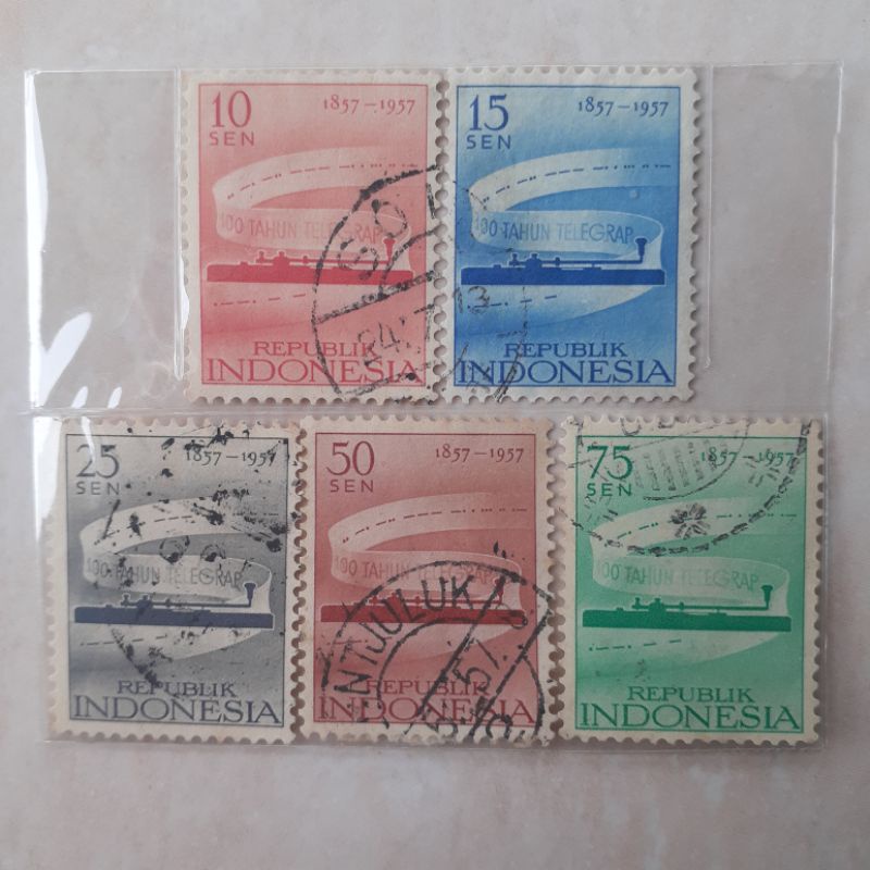 

(A) Perangko Indonesia 100th Telegram Tahun 1957 set lengkap - 5pcs