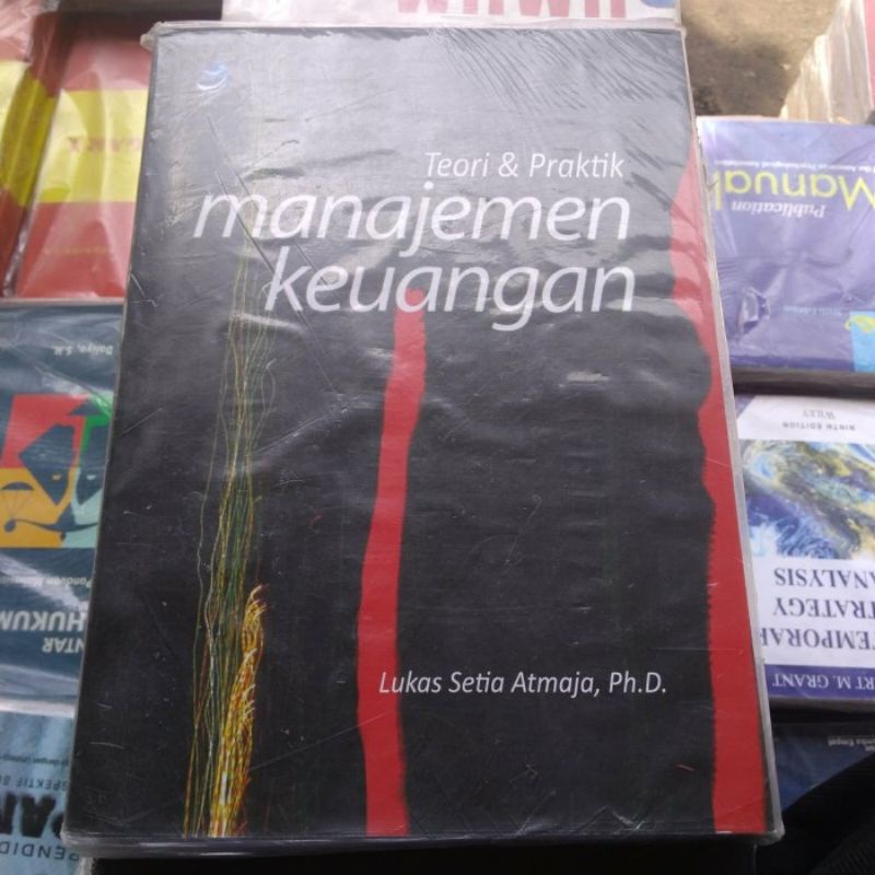 

teori dan praktik praktek manajemen keuangan lukas setia atmaja