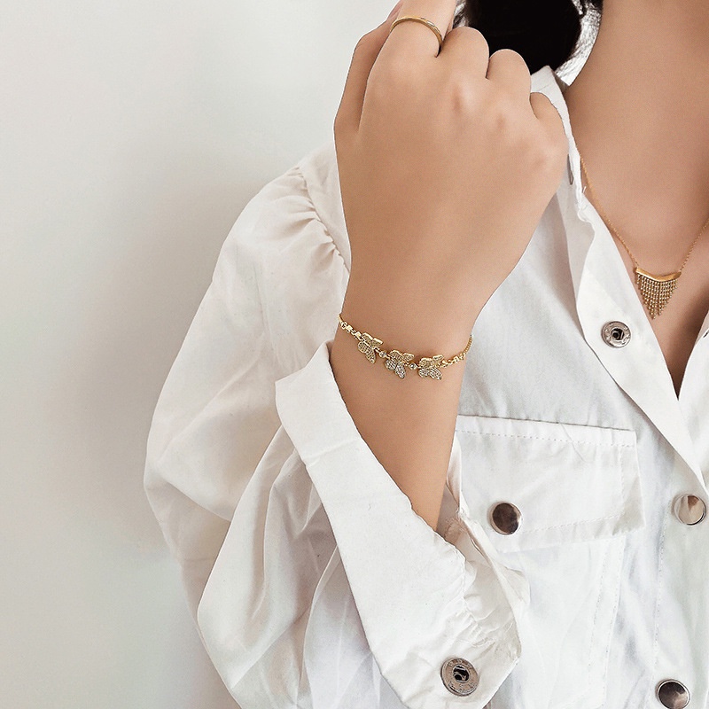 Gelang Tangan Desain Kupu-Kupu Aksen Zircon Warna Permen Untuk Wanita