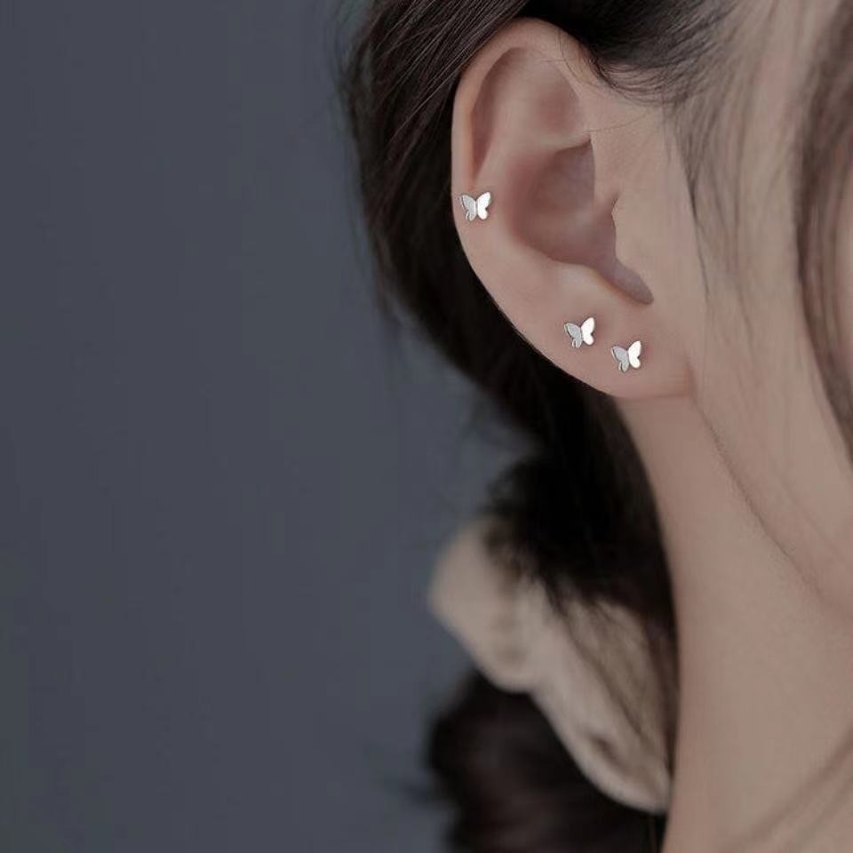 Anting Stud Bentuk Kupu-Kupu Geometris Asimetris Model Terbuka Warna Silver Untuk Wanita Hoops