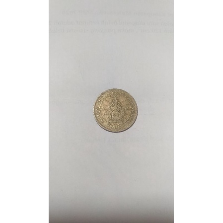 uang koin 100 rupiah wayang