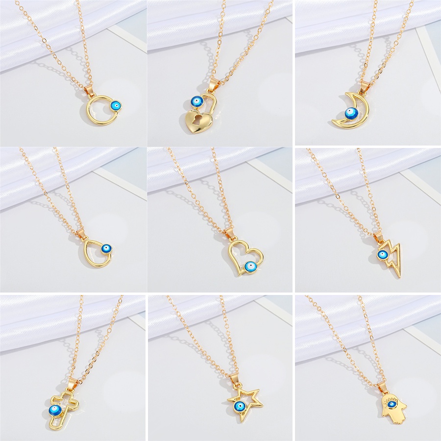 Kalung Rantai Klavikula Emas 18k Hias Liontin Hati Salib Mata Biru Model Rongga Untuk Unisex