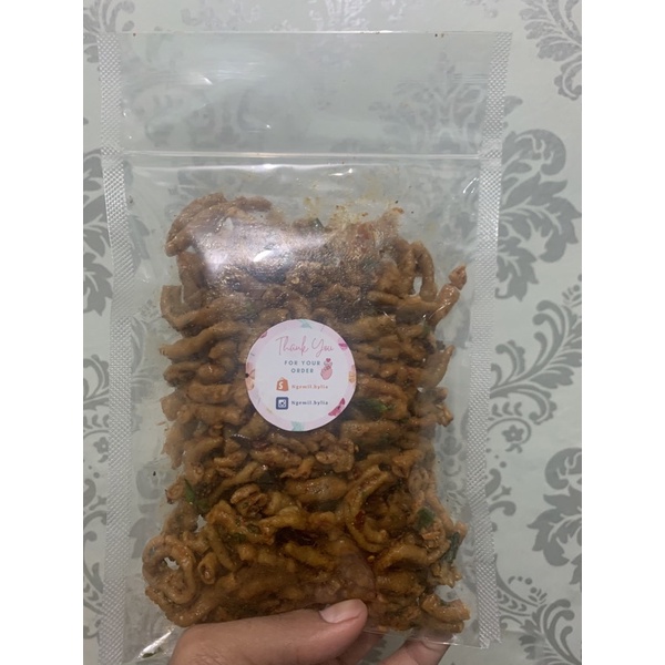 

usus pedas asin daun jeruk kemasan 100 gram