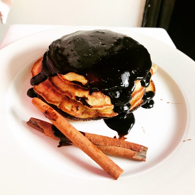 

Homemade almond pancake with cinnamon and chocolate ganache topping