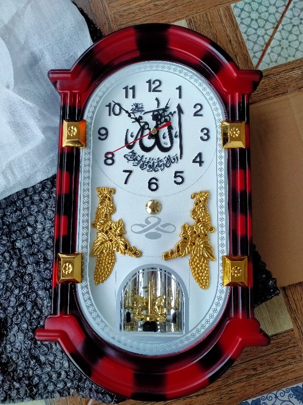 Jam Dinding Unik Bunyi Komedi Putar