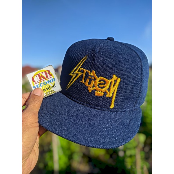 Topi pria original branded snapback STUSSY X REVOLUTION COME OF AGE