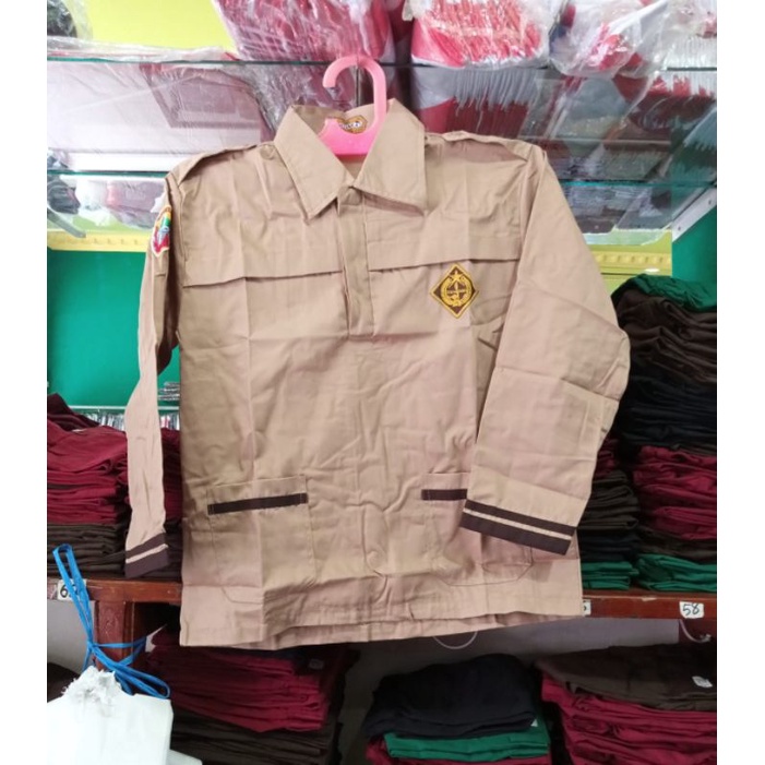 

Baju pramuka siaga, tempahan merk MUTIARA Bahan Dril berkualitas mutu terjamin!