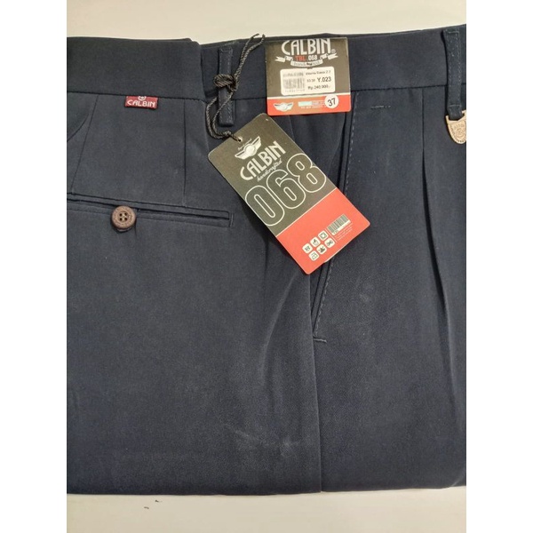 celana panjang bahan pria merk Calbin warna biru Dongker