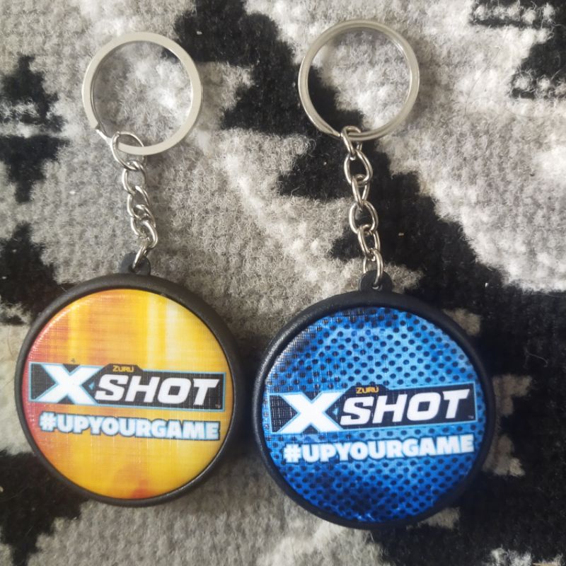 X Shot Gantungan Kunci