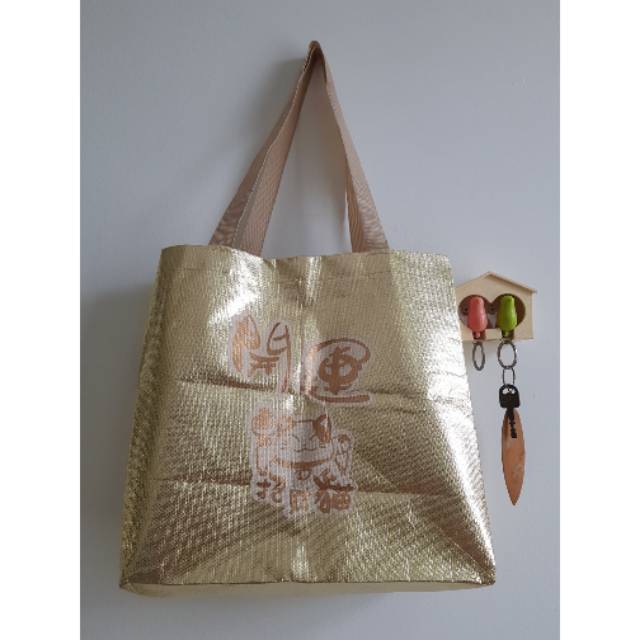 Tas selempang kucing keberuntungan emas