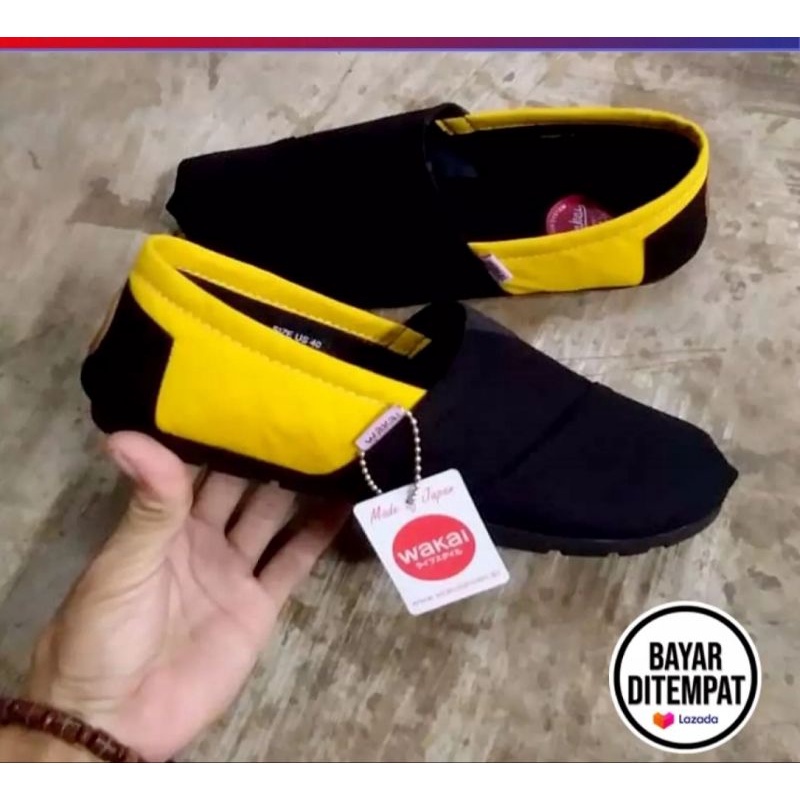 Fenzshoes.id - SEPATU SLIP ON ANAK WAKAI HITAM KUNING TERBARU