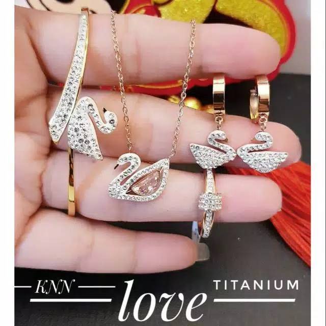 Satu set Titanium  angsa putih
