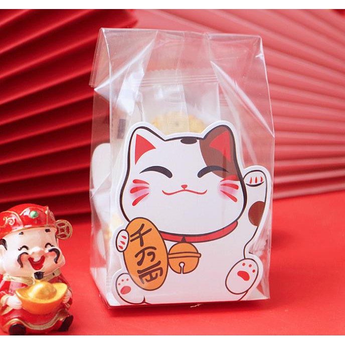 

plastik set motif lucky cat , plastik packing kado , plastik set hadia