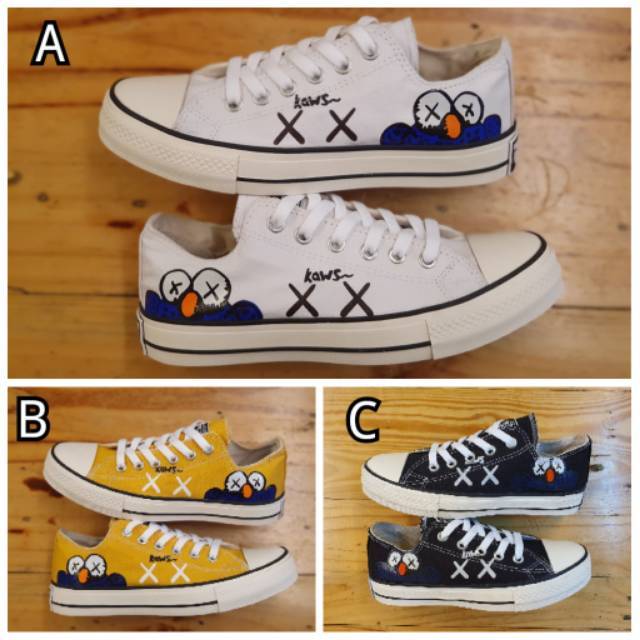 harga converse x kaws
